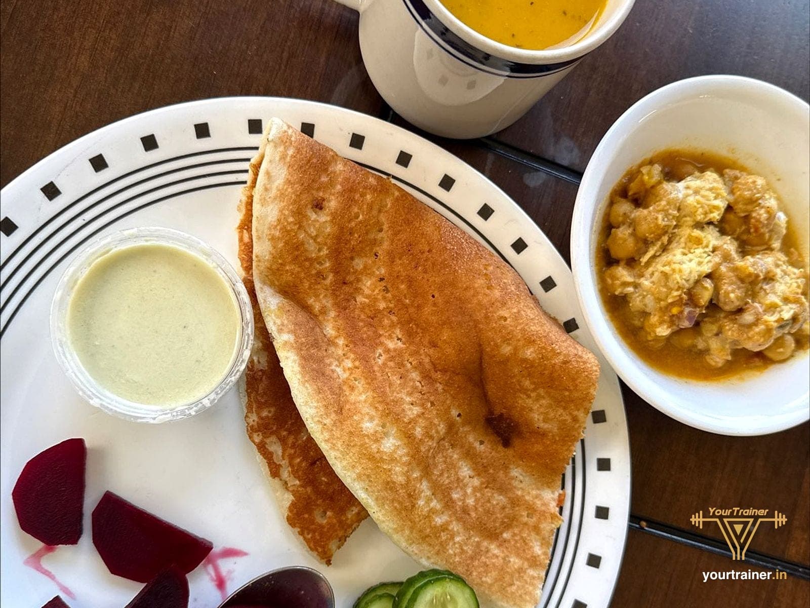 Dosa with chana curry, coconut chutney, beetroot and cucumber