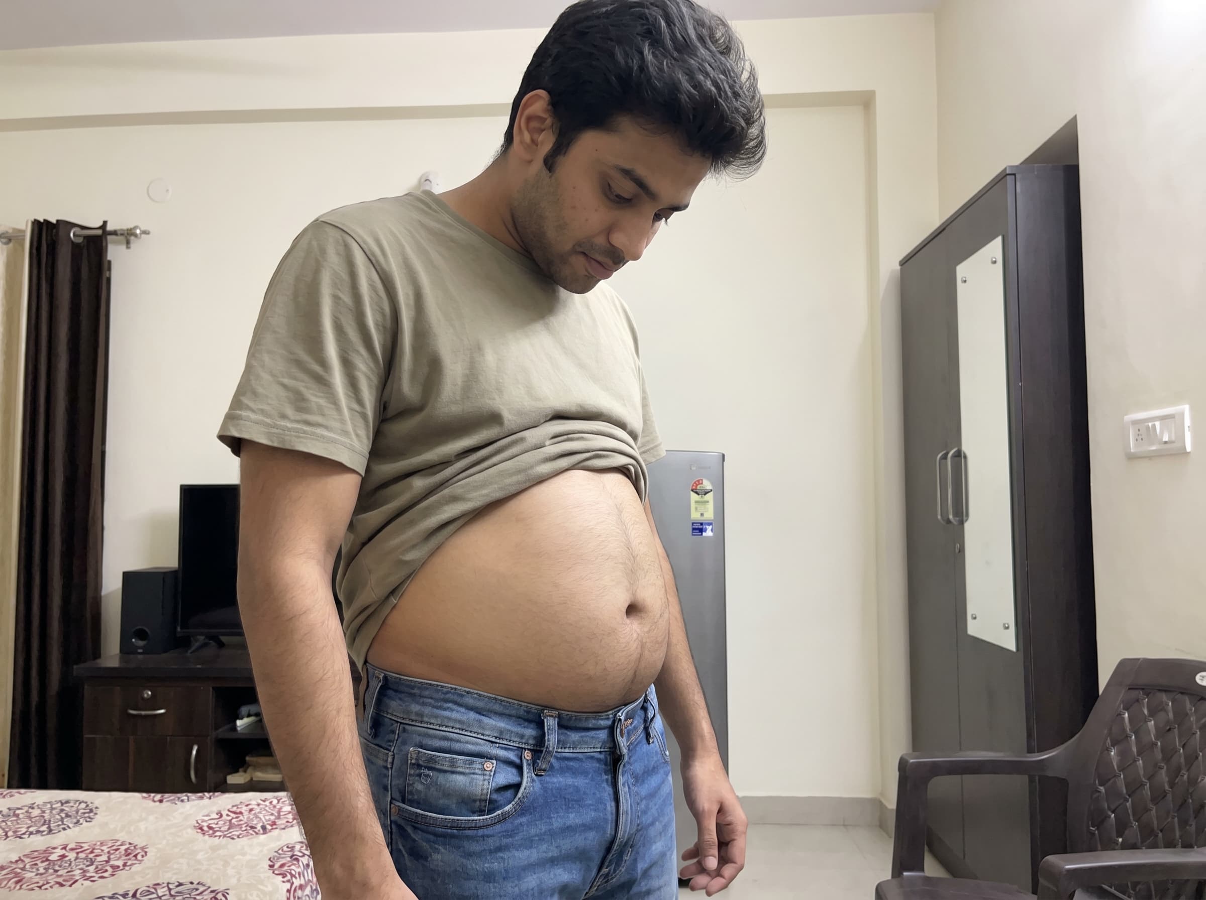 Skinny-fat body composition - Indian man at normal BMI with visible belly and low muscle mass